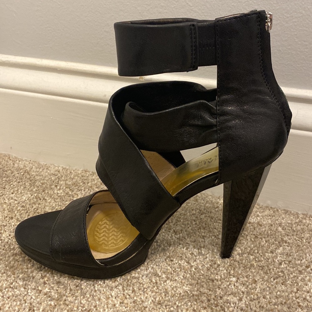 Like new Michael Kors black platform zip up sandals. Size 8.